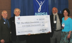 USTA Presents Check - NIRSA Know May/June 2006