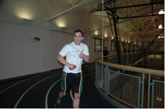Running on the indoor track at the University of Oregon